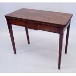 A Georgian mahogany fold top tea table on square supports, 91 x 45cm