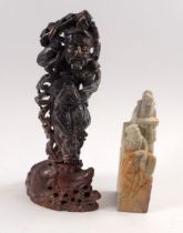 A Chinese soapstone figure of a deity, 21cm tall and a carved stone seal of scholars, 13.5cm tall