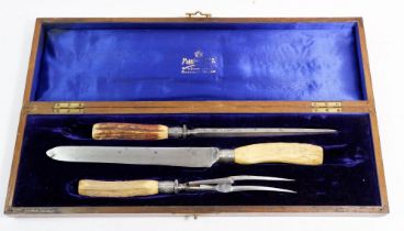 A Victorian Mappin & Webb horn handled carving set with silver mounts in oak case