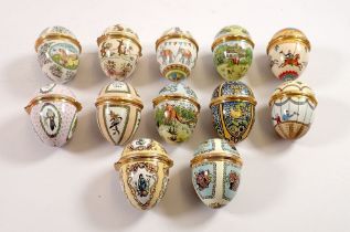 A set of twelve Halcyon Days Easter egg form enamel boxes, 1980 to 1991