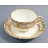 A Minton cup and saucer with gilt border decoration, G9382