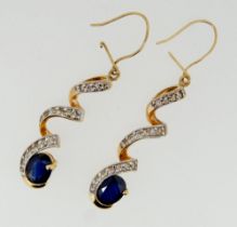 A pair of spiral set sapphire and diamond earrings, unmarked, total weight 6.2g
