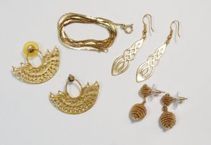 Three pairs of gold plated earrings and a gold plated necklace