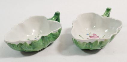 A pair of 18th century Doccia leaf form butter boats moulded leaves and painted flowers, 9.5cm x 6.