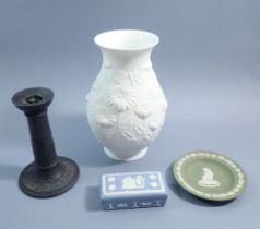 A Kaiser white bisque vase decorated flowers, 20cm tall and three Wedgwood Jasperware items (4)