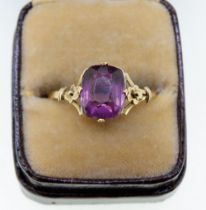 A Victorian gold amethyst ring on floral shoulders, 2g, size R-S