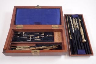 A Houghton Butcher mahogany box containing various drawing instruments