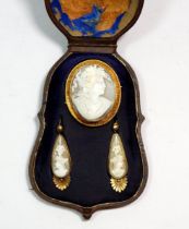 A Victorian 15 carat gold Etruscan style shell cameo brooch and pair of pendant earrings, all in