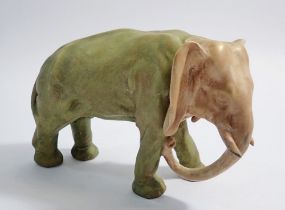 A Royal Dux green and gold elephant, 13cm tall