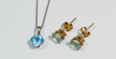 An 18 carat white gold pendant necklace with blue topaz drop and a pair of yellow metal stud