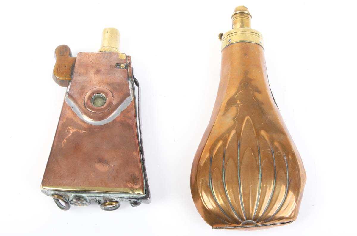 An unusual copper and brass powder or shot flask of tapered rectangular form, h. 6 ins, together