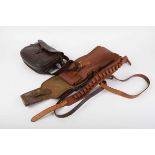 A good Brady canvas and leather gun slip, Brady 12 bore cartridge belt, another canvas gun slip