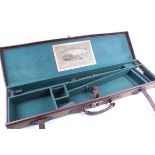 A canvas and leather gun case, green baize fitted interior for 31 ins barrels, John Dickson & Son