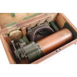 Ross. London 7x50 Prismatic Monocular gunsight stamped broad arrow, no. 123401, in wooden