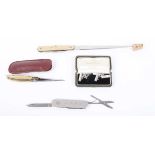 An Alfred Dunhill & Sons silver mounted Victorinox pocket knife dated 1981, together with a