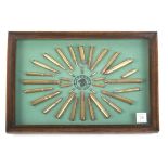 A framed and glazed Kynoch rifle cartridge display board (inert) 13½ ins x 17½ ins