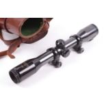 A Swarovski Optik Tirol Habicht 4 rifle scope with Parker Hale mounts, in leather case