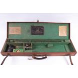 A canvas and leather gun case for restoration, baize-lined interior fitted for 28 ins barrels (