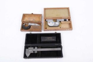 Cased Etalon No.23C 0-1" micrometer, one other cased Etalon micrometer with dial indicator, and a