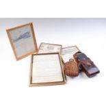 Leather cased Zeiss Ikon Ikonta folding camera, wicker covered drinks flask, framed and glazed