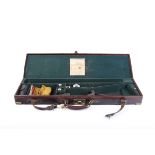 Brass mounted leather motor case embossed N.M. Fergusson, green baize lined interior fitted for 28