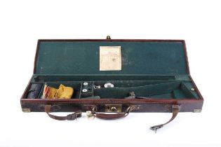 Brass mounted leather motor case embossed N.M. Fergusson, green baize lined interior fitted for 28