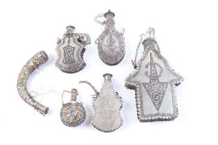 Six oriental metal powder flasks