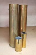 Two WWI German brass shell cases dated February and July 1917, together with two No.10 Mk 3 engine