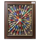 A large framed and glazed modern cartridge display board, 25 x 20½ ins