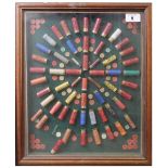 Ⓕ (S2) A framed and glazed cartridge display board; 9mm to 12 bore, various maker's, 24 x 20 ins