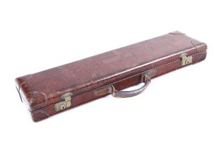 A lightweight Churchill XXV leather gun case, with green baize lined fitted interior for 25 ins