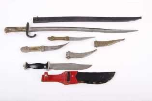 A group of edged weapons to include French Chassepot Yataghan sword bayonet dated 1874, two