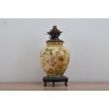 A ceramic vase converted to a lamp, yellow ground, with birds and fauna design, Kings Duplex