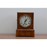 A 19th century burr walnut cased mantel clock, retailed by Camerer Russ & Co, 522 Oxford Street,