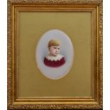 A framed 19th century Dresden ceramic plaque, of a little boy, signed lower right 'L Sturm,