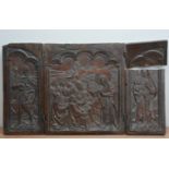 An 18th century and later wooden foldable triptych, possibly from a coffer, the panels depicting