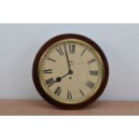 A Smith 8-day circular wall clock, the dial with Roman numerals, wooden case, untested AF 37cm x