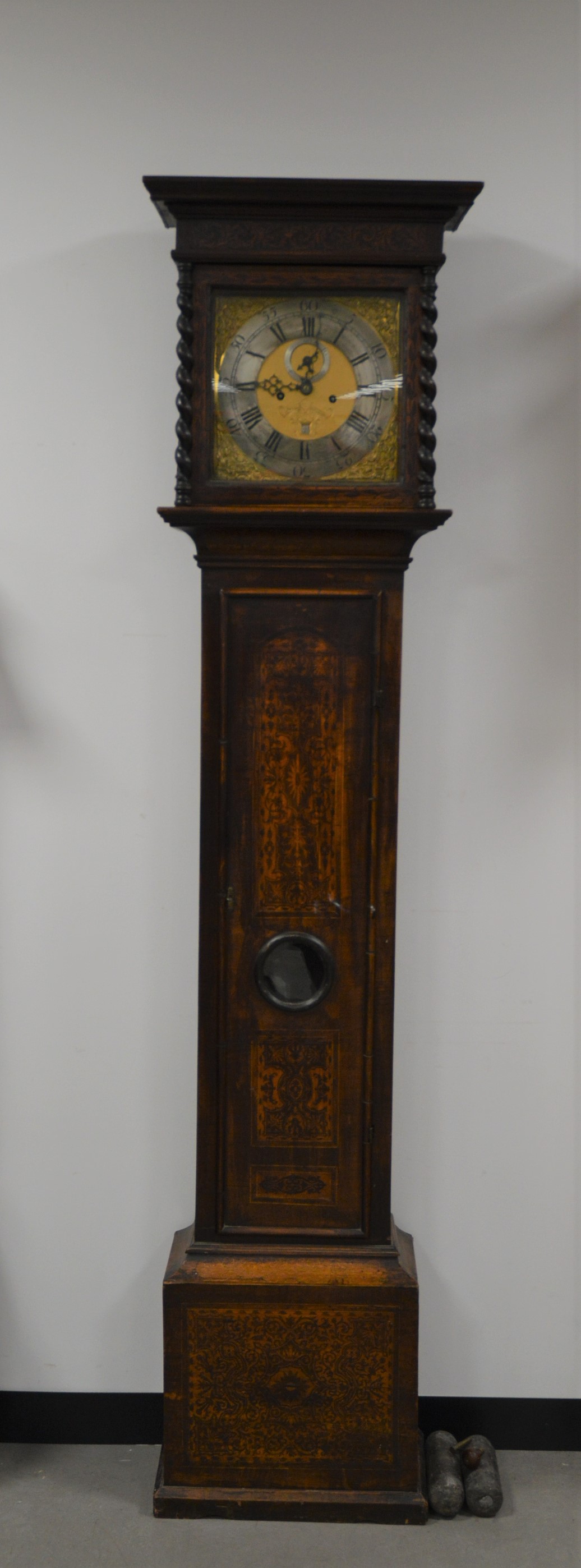 A 19th century longcase clock, mahogany case with inlaid decoration, brass and silvered dial, with