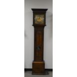 A 19th century longcase clock, mahogany case with inlaid decoration, brass and silvered dial, with