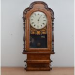 A late 19th/early 20th century gothic style wall clock, the dial with Roman numerals, string inlay
