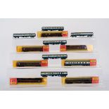 Hornby Minitrix N Gauge BR maroon and blue/grey coaching stock, a cased rake of maroon examples, 305