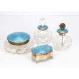 Four Art Deco period blue enamelled dressing table items, including a silver trinket box, a cut