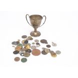 A collection of silver and silver plated items and more, including a small silver trophy cup, a pair