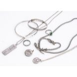 A collection of silver jewellery, including a silver ingot for 1977, a serpent necklace and bracelet