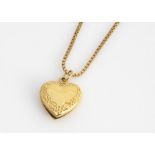 A 9ct gold heart shaped locket and chain, 31.7cm together, 5.7g