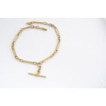 An 18ct gold watch chain, the double Albert, with T bar, and one snap clasp, 42 cm 57.3g