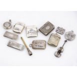 A group of twelve collectable silver and silver plated items, including four silver vesta cases, one