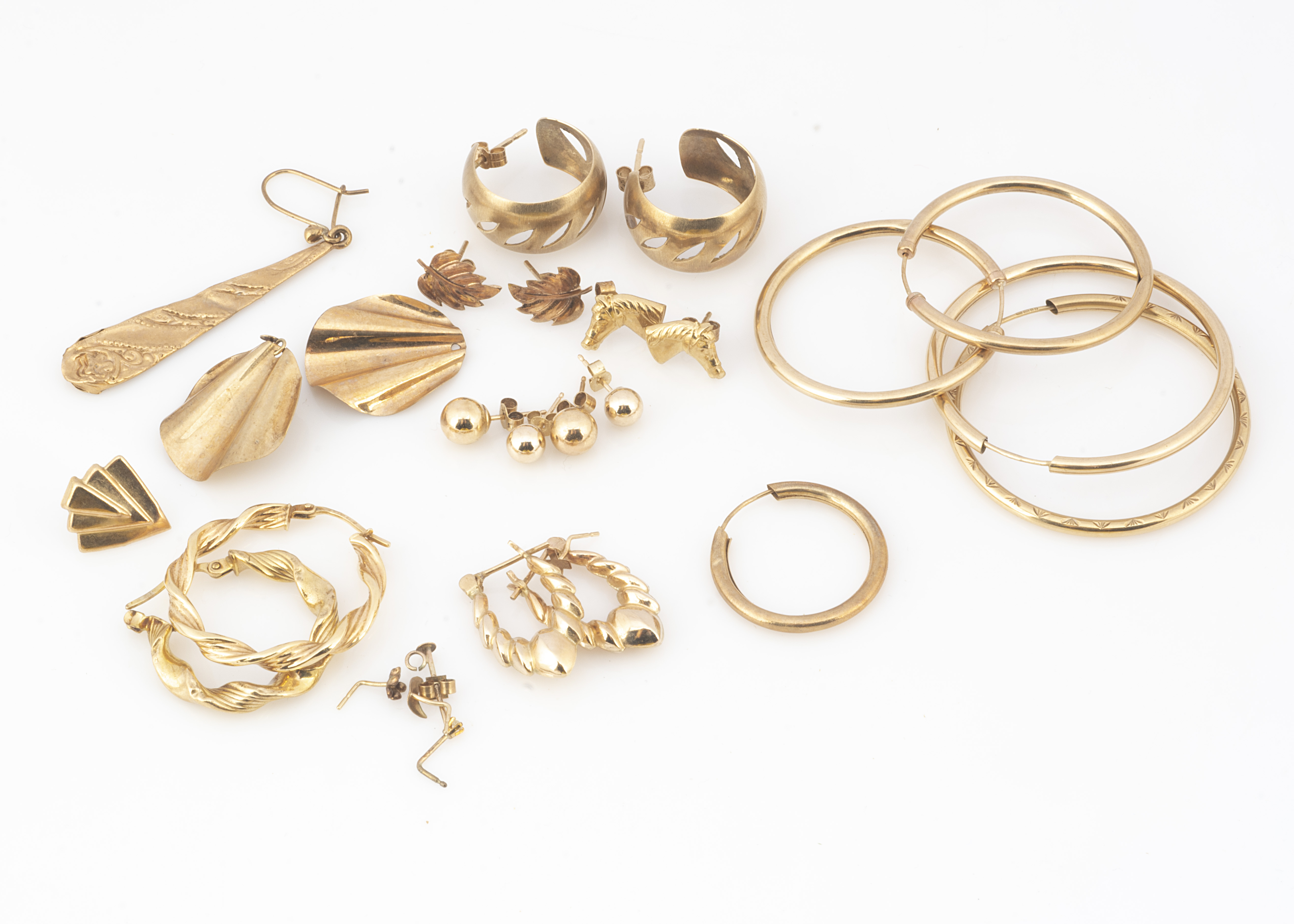 A collection of 9ct gold earrings, some af, including hoops, drops and studs, 13g