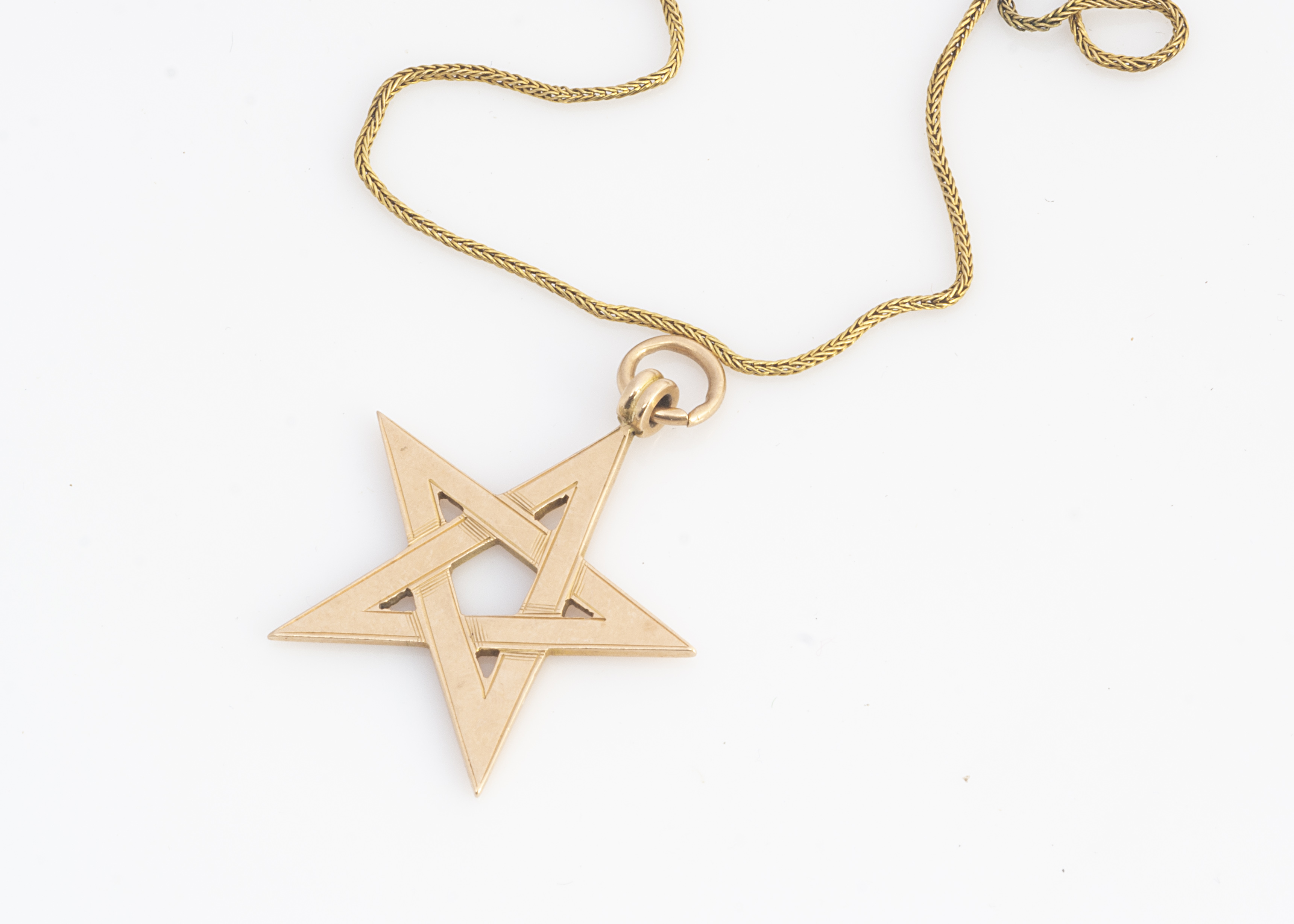 A 15ct gold pentagram pendant, Masonic, marked KNOLE 1414, together with a broken yellow metal