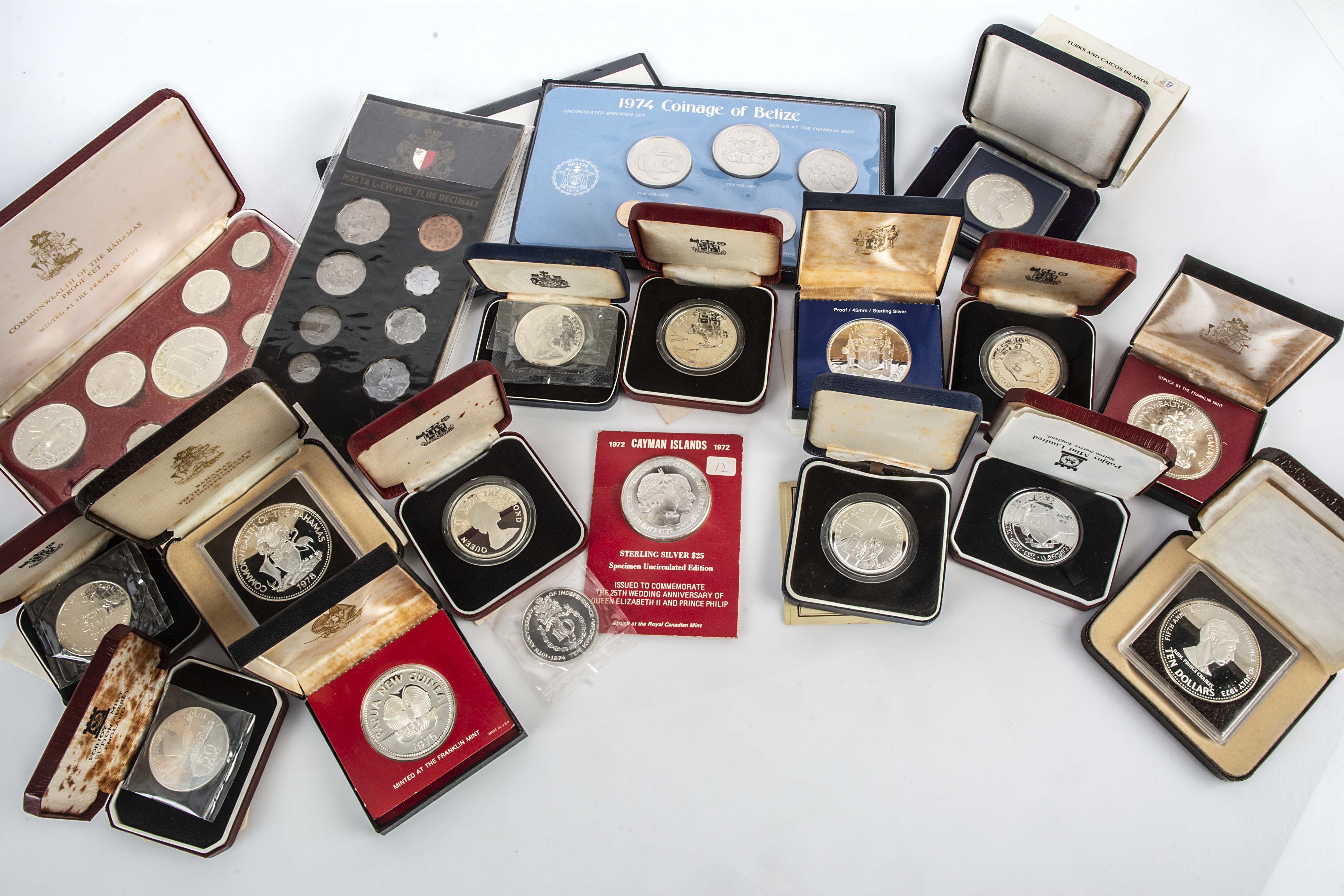 A collection of 1970s and later Commonwealth and other silver and cupro-nickel coins and medallions,